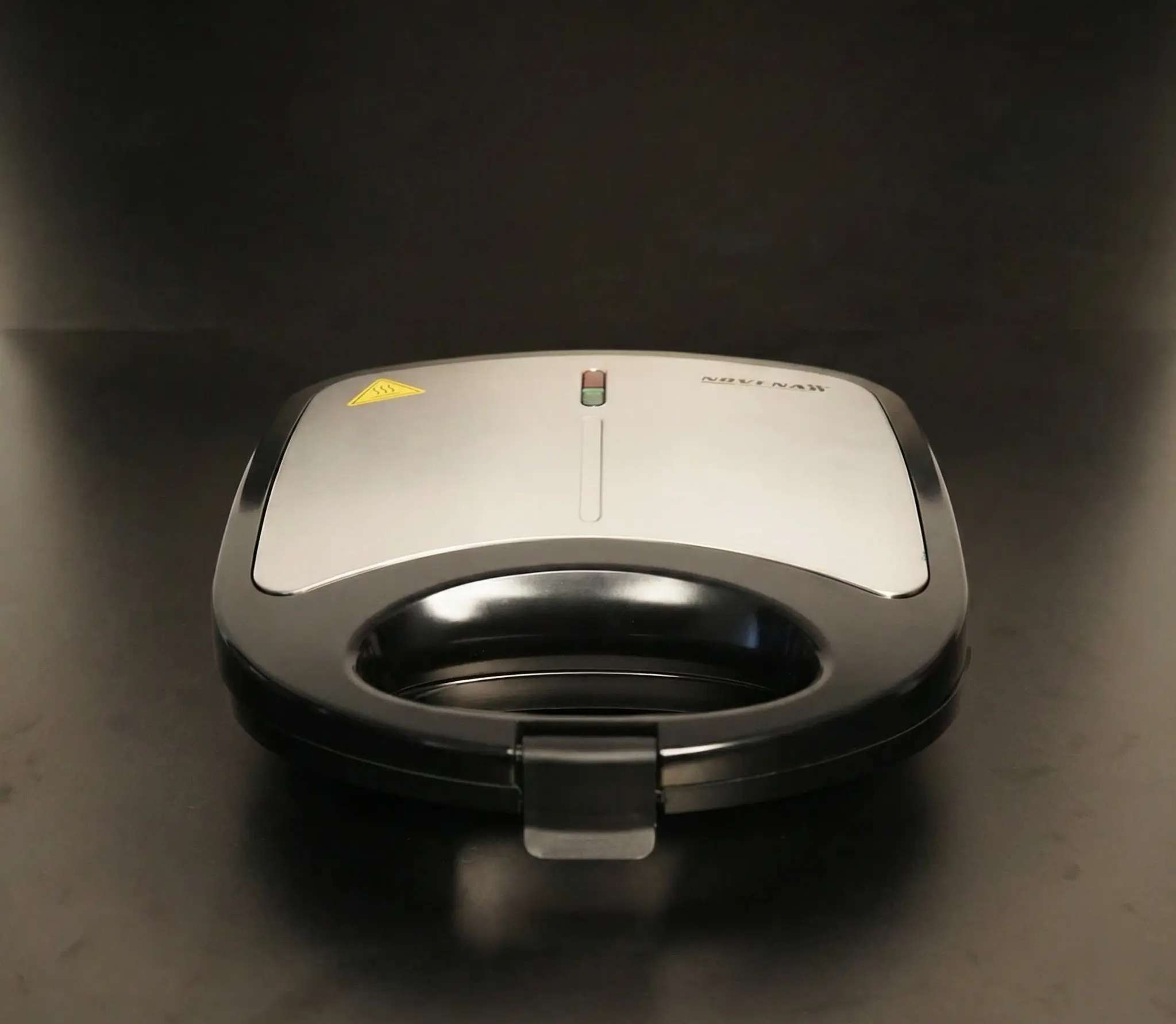 Novena NSM-213 Sandwich Maker – 750W with Non-Stick Triangle Plates, Automatic Temperature Control, and Cool Touch Handle