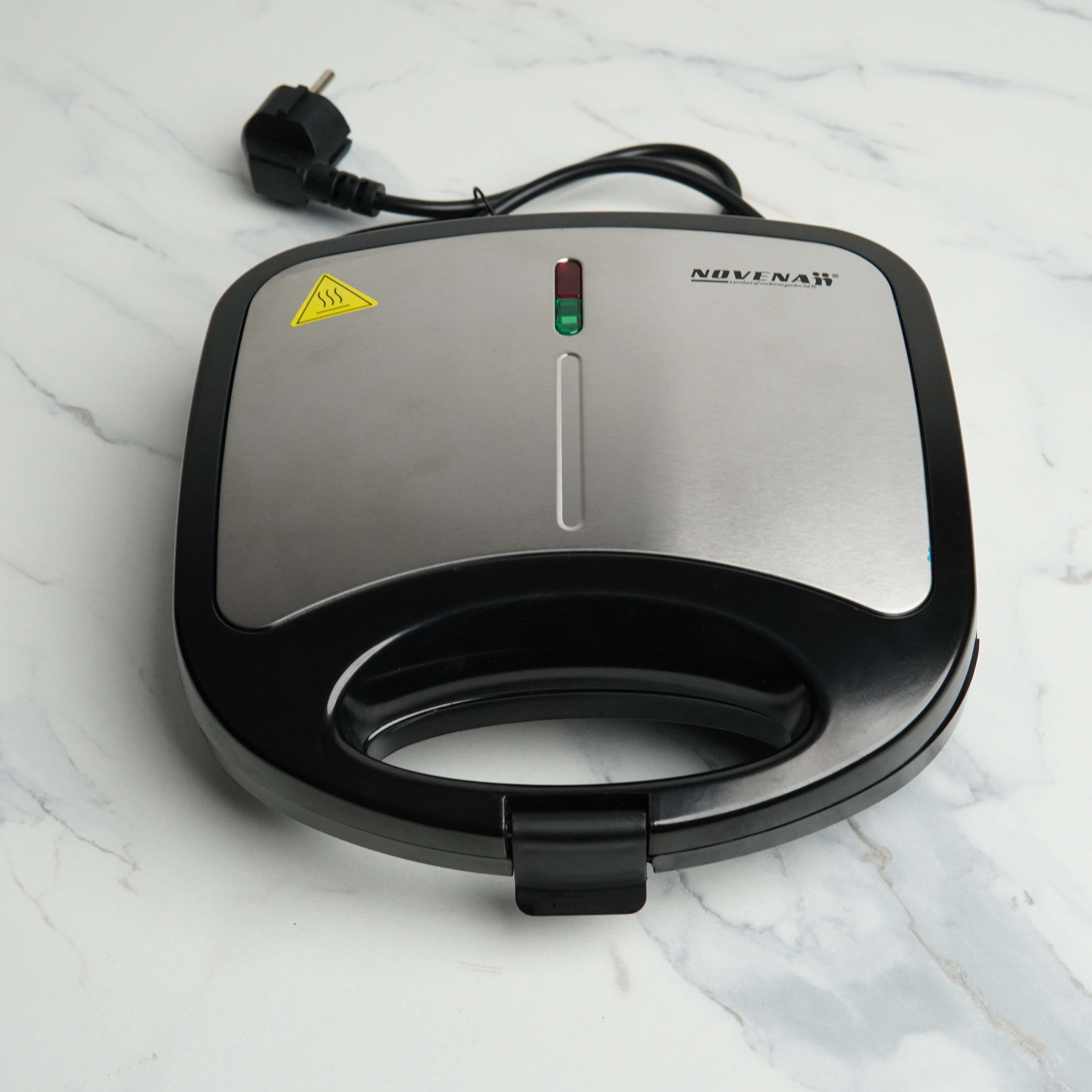 Novena NSM-213 Sandwich Maker – 750W with Non-Stick Triangle Plates, Automatic Temperature Control, and Cool Touch Handle