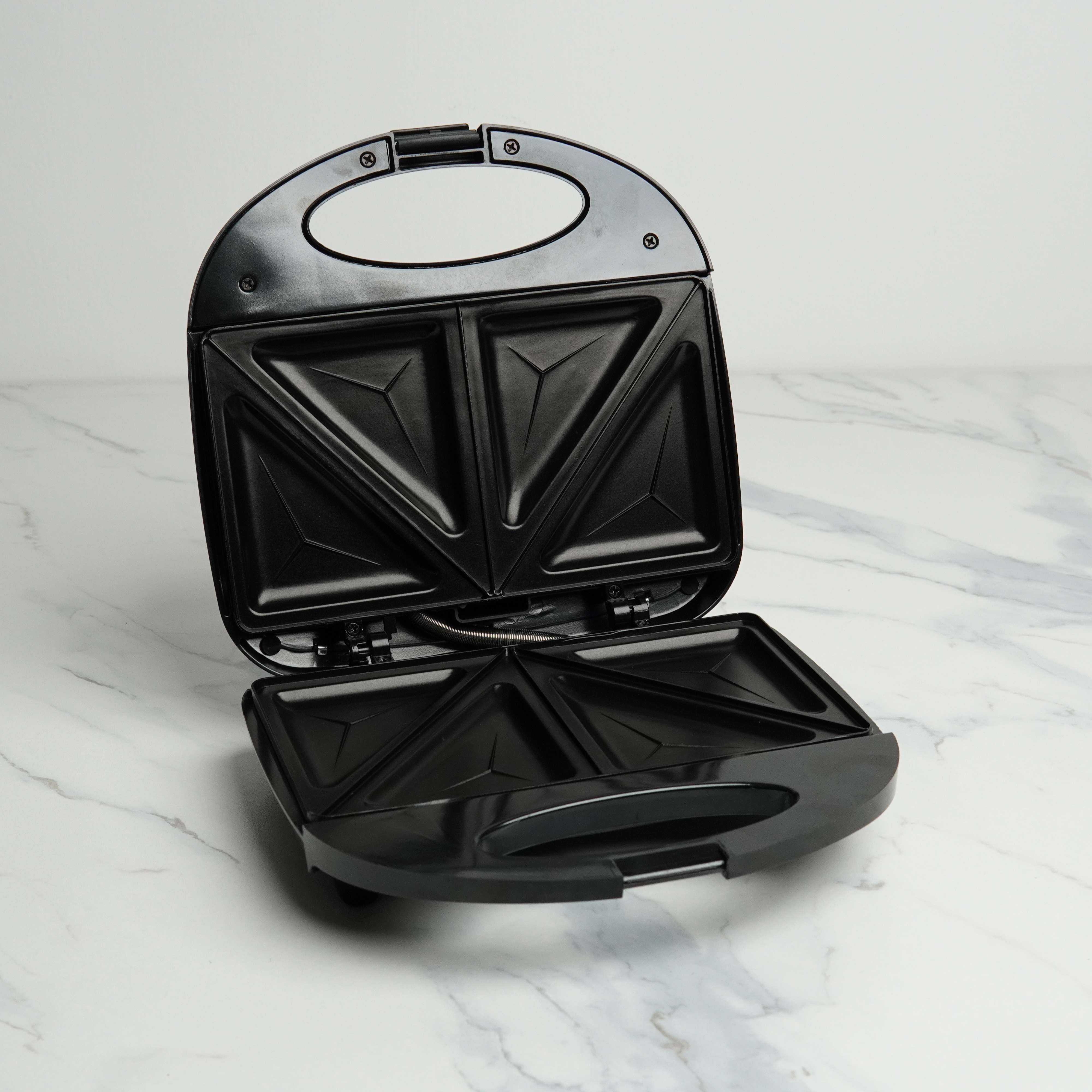 Novena NSM-213 Sandwich Maker – 750W with Non-Stick Triangle Plates, Automatic Temperature Control, and Cool Touch Handle