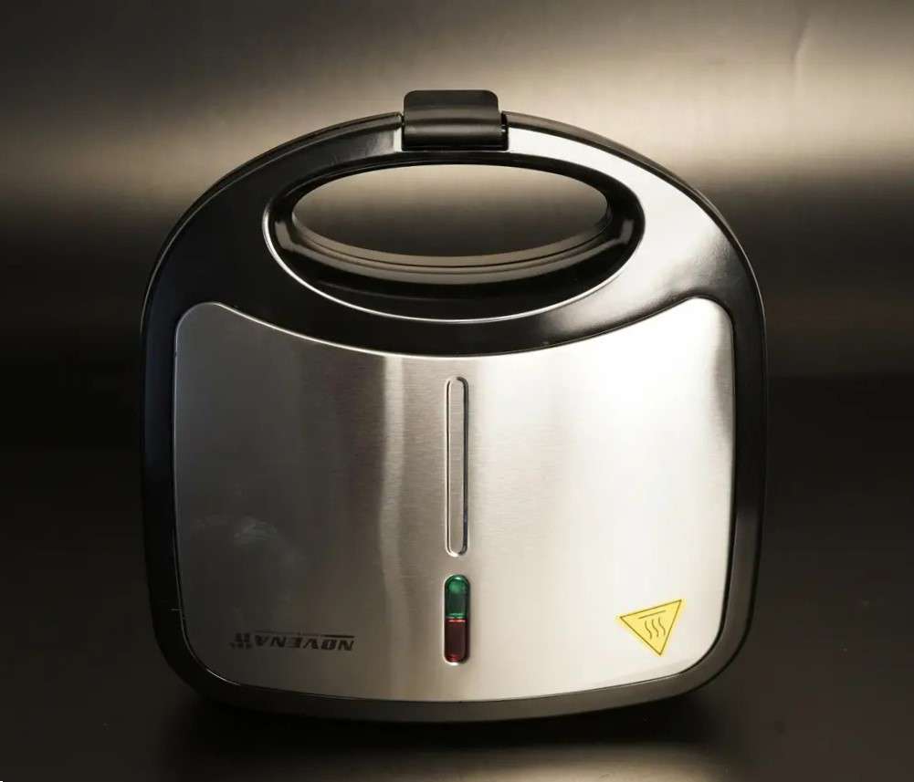 Novena NSM-213 Sandwich Maker – 750W with Non-Stick Triangle Plates, Automatic Temperature Control, and Cool Touch Handle