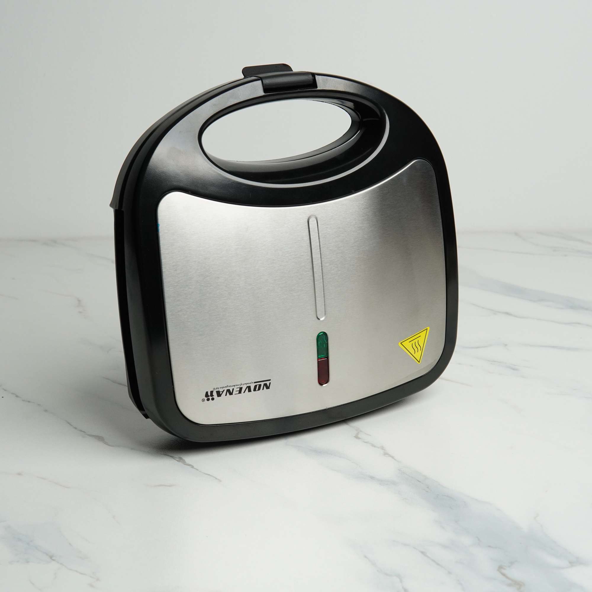 Novena NSM-213 Sandwich Maker – 750W with Non-Stick Triangle Plates, Automatic Temperature Control, and Cool Touch Handle